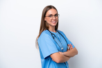 Wall Mural - Young nurse caucasian woman isolated on white background with arms crossed and looking forward