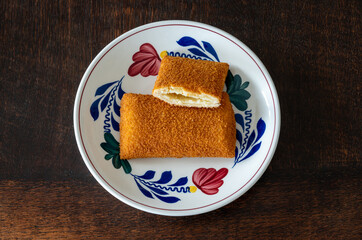 Kaassouffle on the plate, a popular dutch fast food snack consisting of melted cheese inside a breaded and deep fried wrap