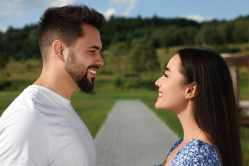 Wall Mural - Romantic date. Beautiful couple spending time together outdoors