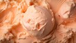 Ice cream ball on melting ice cream texture background in peach fuzz color of 2024 year