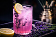 Lavender lemonade cocktail with ice and lemon close up