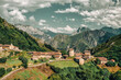 This striking photograph captures the essence of the medieval village of Banduxu, perched atop a mountain pass in the wild landscapes of Asturias, Spain.