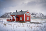 Fototapeta  - Typical Lofoten red house in the snow