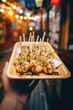 Takoyaki, a popular Traditional Japanese snack. octopus balls. street food Asia