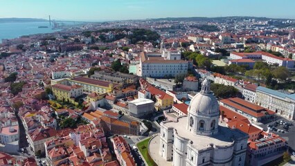 Wall Mural - Aerial view of Lisbon city center. Drone forward. View of National Pantheon and Igreja de São Vicente de Fora. Rooftops of Lisbon. Famous European travel destination and capital of Portugal.