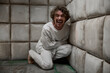 © Nomad_Soul - Mad crazy man patient wearing straitjacket laughing terrifying