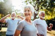© Celina - Portrait of senior people doing a fitness exercise in an outdoor park