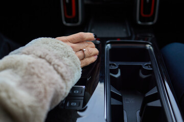 selector automatic transmission with leather in the interior of a modern expensive car. the backgrou