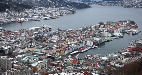 Wall Mural - Elevated, panoramic view of the city skyline of Bergen, Norway, during winter time with snow
