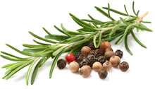 Rosemary with peppercorns isolated on white background, cutout