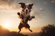 A dog captured mid-air as it jumps with its paws raised. Suitable for various uses