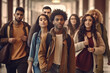 © FutureStock - Multiracial students are walking in university hall during break.