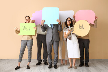 Sticker - Business people holding speech bubbles with words near beige wall