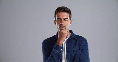 Aufkleber - Man, thinking or doubt in studio portrait in confused, idea or frustrated by gray background. Person, face and decision with planning for problem solving, project insight and choice by mockup space
