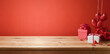 Valentine's day background with empty wooden table, gift box and heart shapes. Holiday mock up for design and product display