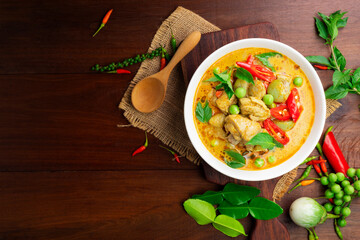 Canvas Print - Chicken green curry Asian food, Beef green curry Thai food on a soup bowl with a mixture of herbs, vegetables and Thai red chilli spices. Top view.