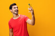 © SHOTPRIME STUDIO - Copy man cyberspace portrait message communication smiling happy space studio yellow technology phone smartphone phone mobile