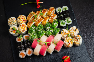 Wall Mural - sushi on the black background