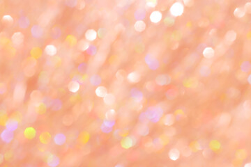 Wall Mural - abstract bokeh background peach colored, natural glare from lights, trend color year 2024 peach fuzz