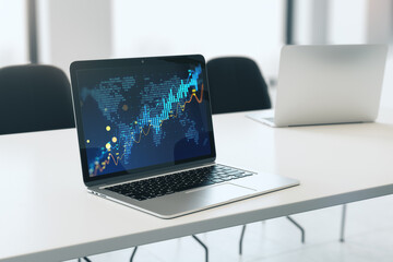 Poster - Close up of laptop on desk with glowing candlestick forex chart on blurry background. Trade, finance and stock concept. 3D Rendering.