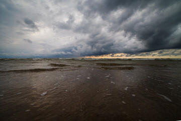 Wall Mural - Clouds over Baltic sea at Liepaja, Latvia.