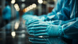 Close-up of some. hands with gloves after washing in the operating room
