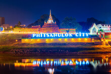 Text Letter Light Phitsanulok City And Chedi Of Wat Ratchaburana At The Nan River And The Park In The Loy Krathong Festiva 2023 At Night In Phitsanulok,Thailand.