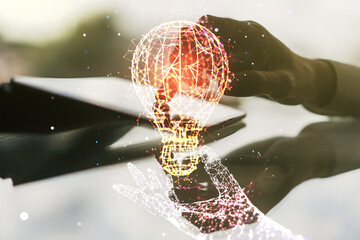 Poster - Creative light bulb illustration with finger presses on a digital tablet on background, future technology concept. Multiexposure