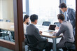 © Blue Jean Images - Business people talking in meeting room