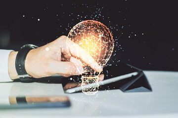 Poster - Creative light bulb illustration with finger presses on a digital tablet on background, future technology concept. Multiexposure