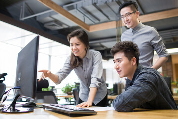IT workers talking in office
