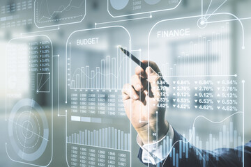 Poster - Man hand with pen working with abstract virtual analytics data spreadsheet on blurred office background, analytics and analysis concept. Multiexposure