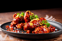 Fried Bbq Chicken Wings In Plate