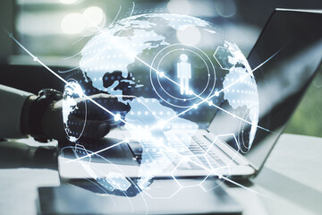 Poster - Social network concept with world map and hands typing on laptop on background. Multiexposure