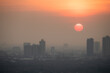 PM 2.5 dust in Bangkok, Thailand. Covered by heavy smog, Misty sunset in downtown with bad air pollution, Bad air pollution in City. Landscape with bad air pollution and Dangerous