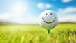 Smiling Golf Ball on Grass
