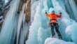 Alpinist ice climber makes his way up on a frozen waterfall with ice tools axe climbing a large wall. Winter outdoor sports activities. Panorama with copy space.