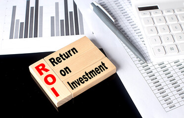 Poster - Word ROI made with wood building blocks, business concept