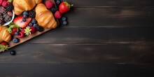 Croissant And Fruits On Wooden Background With Space For Text
