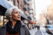 © ADDICTIVE STOCK - Generative AI portrait of an elegant mature black woman in the city
