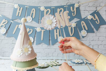 Birthday Celebration With Daisy Theme And Festive Decorations