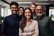 © ADDICTIVE STOCK - Diverse team of professionals posing with a smile
