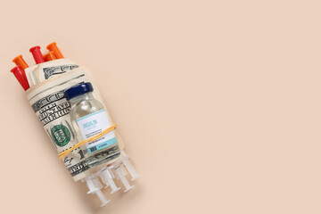 Wall Mural - Insulin with syringes and money on beige background. Expensive medicine concept