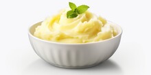 A Delicious Bowl Of Mashed Potatoes Topped With A Fresh Sprig Of Mint. Perfect For A Comforting Meal Or As A Side Dish.