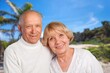 © BillionPhotos.com - Happy senior couple travel on beach vacation.