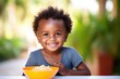 African child smiling and eating a plate full of food. Generative AI