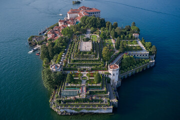 Wall Mural - Aerial drone view of Isola Bella drone panoramic view. Borromean Islands, Lake Maggiore, Piedmont, Europe. Lake Maggiore, island, Isola Bella, Italy. Panorama at sunset on Lake Maggiore top view.