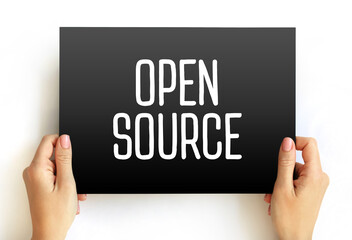 Aufkleber - Open Source is source code that is made freely available for possible modification and redistribution, text concept on card