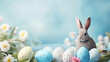 Easter bunny spring card with eggs and flowers on blue background, copy space
