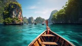 Fototapeta Do akwarium - Tropical turquoise waters with Thai longtail boats gliding past coral reefs and islands in Thailand's Andaman Sea.